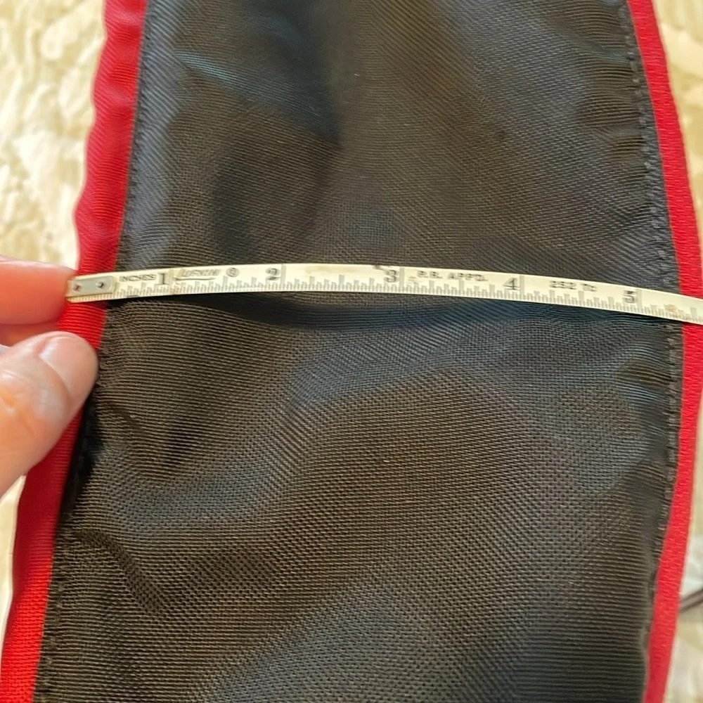 Red Jansport laptop messenger bag. Interior Velcro & outer zippered compartment